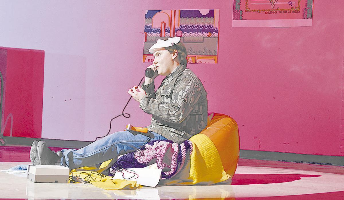 Junior William Biltoft performs in the all-school play. Biltoft played several characters during the performance.