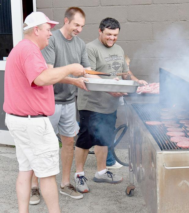 A great turnout supported the Ainsworth Does Drove #54 Hamburger Feed, Fries and Floats during the Friday Night Car and Motorcycle Show. As the Does served the food (Left) and Elk members (Right) grilled the hamburgers.