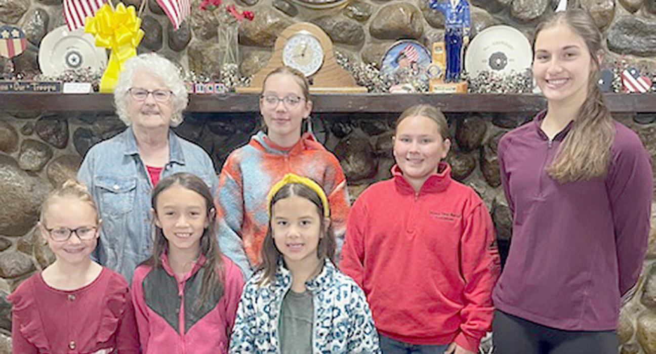 American Junior Legion Auxiliary went throughout Ainsworth to sell poppies for Poppy Day. Participating were (Front Row - Left to Right): Gracyn Peterson, CeCe Kerrigan, Brynn Pierce; (Back Row - Left to Right): Junior Auxiliary Advisor Shari Luther, Bailee Rea, Ava Barthel and Willa Flynn.