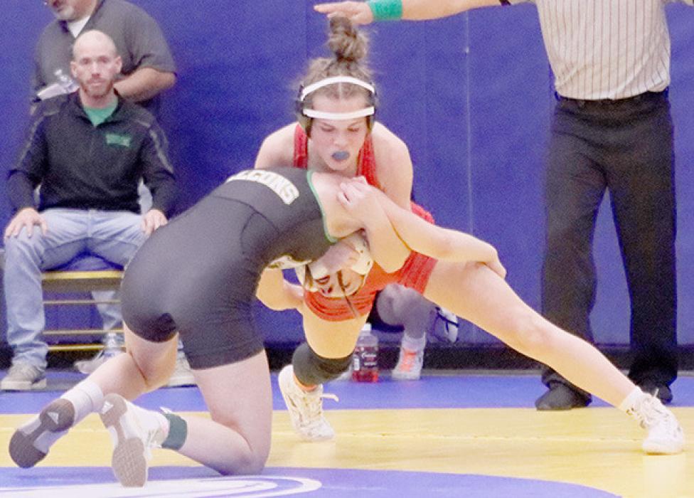 Paisley Hoffman pinned Teegen Hasebroock of Elkhorn Valley in the 110 lb. weight class at the West Holt Invitational.