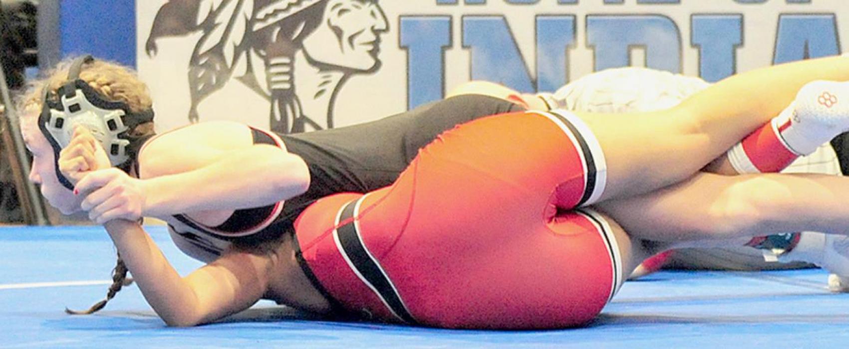 Jolyn Pozehl lost her first match on the season, but still left the Winnebago Invitational with a 2nd place medal in the 114 lb. weight class.