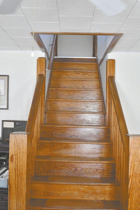 A before (left) and after (right) sneek peak at the recently refinished hardwood floors in the museum.