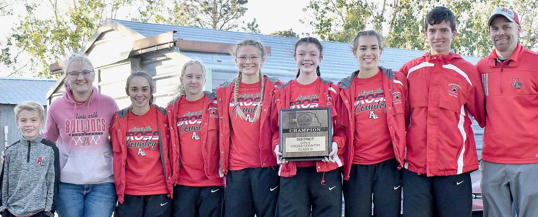 Ainsworth will send the Ainsworth Girls Cross Country Team and Corbin Swanson for the boys team to the 2022 NSAA State Cross Country Meet in Kearney on Friday, October 21st. Representing Ainsworth at the State Cross Country Meet will be (left to right) Student Manager Blake Hansmeyer, Assistant Coach Lauren Osborne, Tessa Barthel, Preselyn Goochey, Emma Kennedy, Payton Moody, Katherine Kerrigan, Corbin Swanson and Head Coach Jared Hansmeyer.