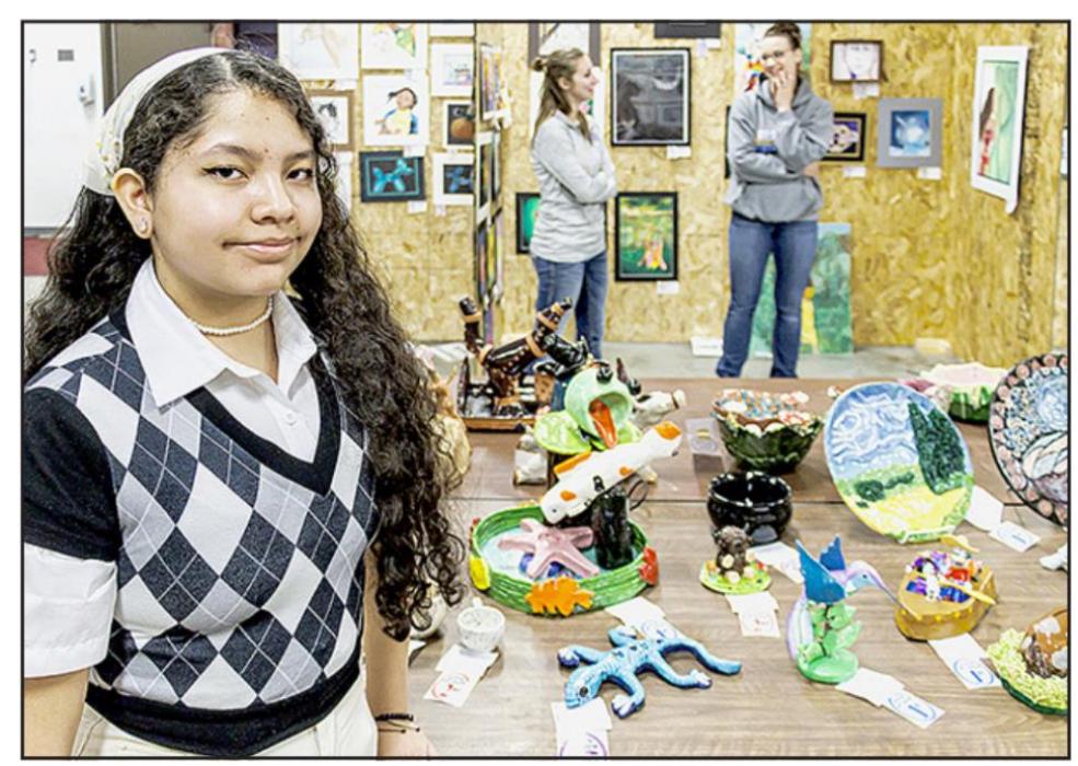 AHS sophomore June Iturbide entered a ceramic lizard which received the Judge’s Merit award, and a ceramic hummingbird which received first place.