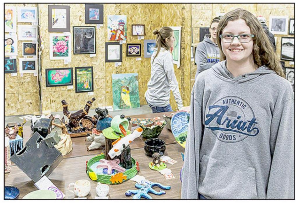 AHS sophomore Jaycily Johnson created a ceramic animal water fountain which earned her a first place. In second place was her ceramic Highland cow.