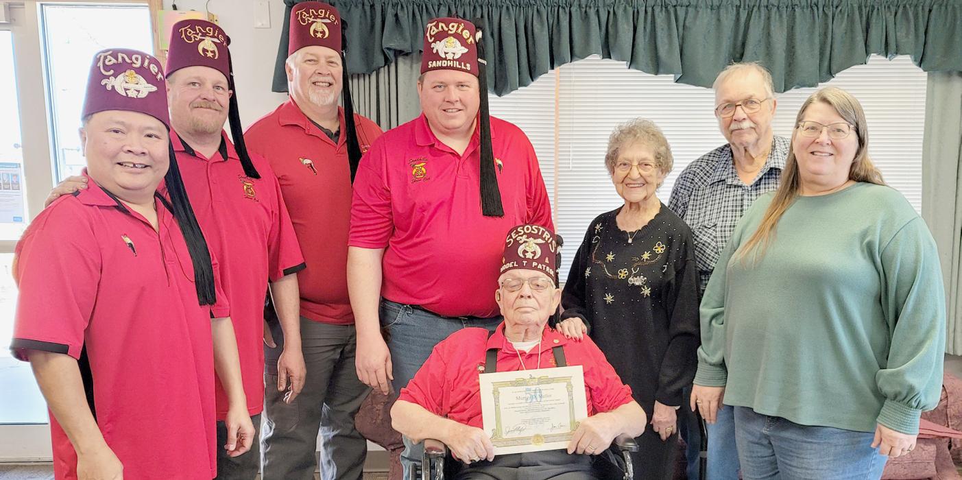Present for the presentation of the 50 Year Shriners Membership Pin were (Left to Right): Alvin Benemerito, Cody Croghan, Barry Frerichs, Jeremiah Schartz, Murray Mellor, Jean Mellor, Dale Mellor and Dianne Dunkle.