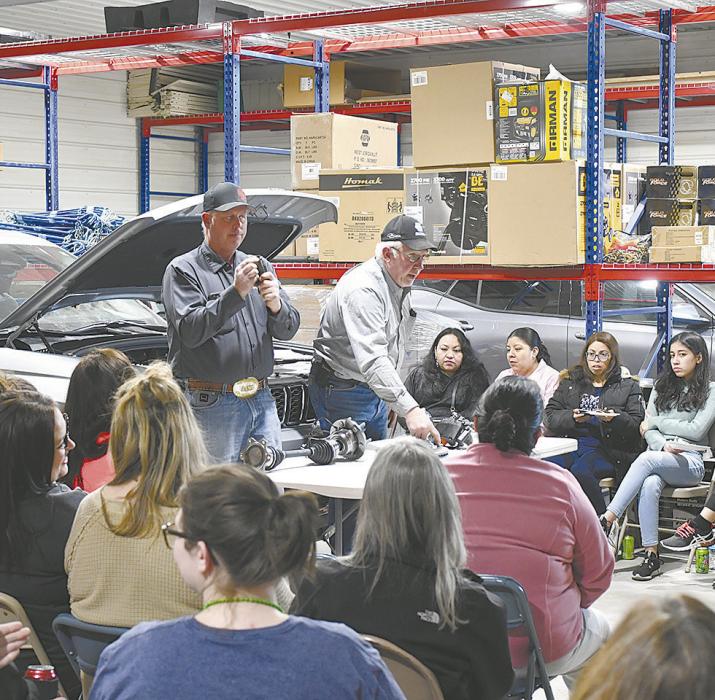 Dave Sherman and Jeremiah Dailey give a presentation to the women who attended the event.