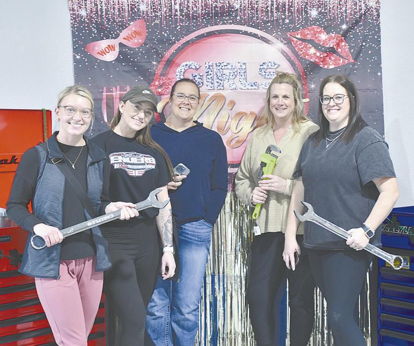 Macey VonHeeder, Samantha Kuehn, Crystal Dailey, Sarah Schipporeit, and Melissa Freudenberg took advantage of the photoboth and props that were provided.