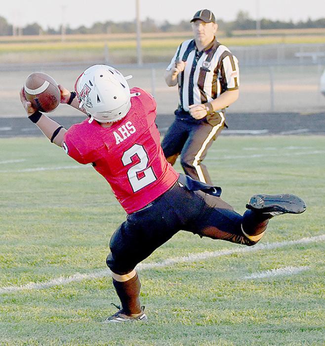 Morgan Kinney caught the first of his three touchdown passes with just 42 seconds left in the first quarter to give Ainsworth a 12-0 lead.