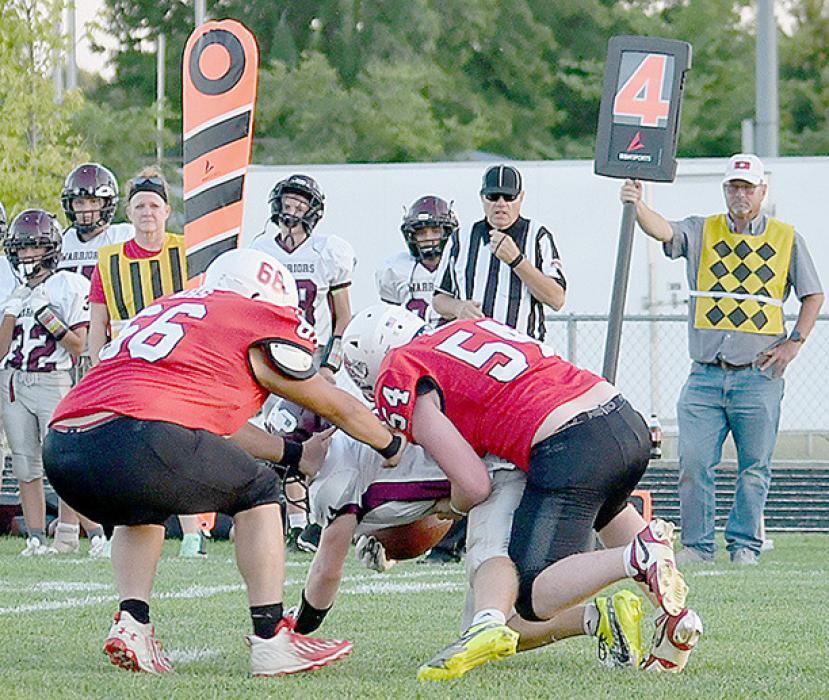 Witten Painter and Trevor Pike stopped Neligh/Oakdale’s Corbin Hoefer on a fourth down play. Ainsworth’s defense stopped the Warriors six times on fourth down plays to take the ball back on downs.