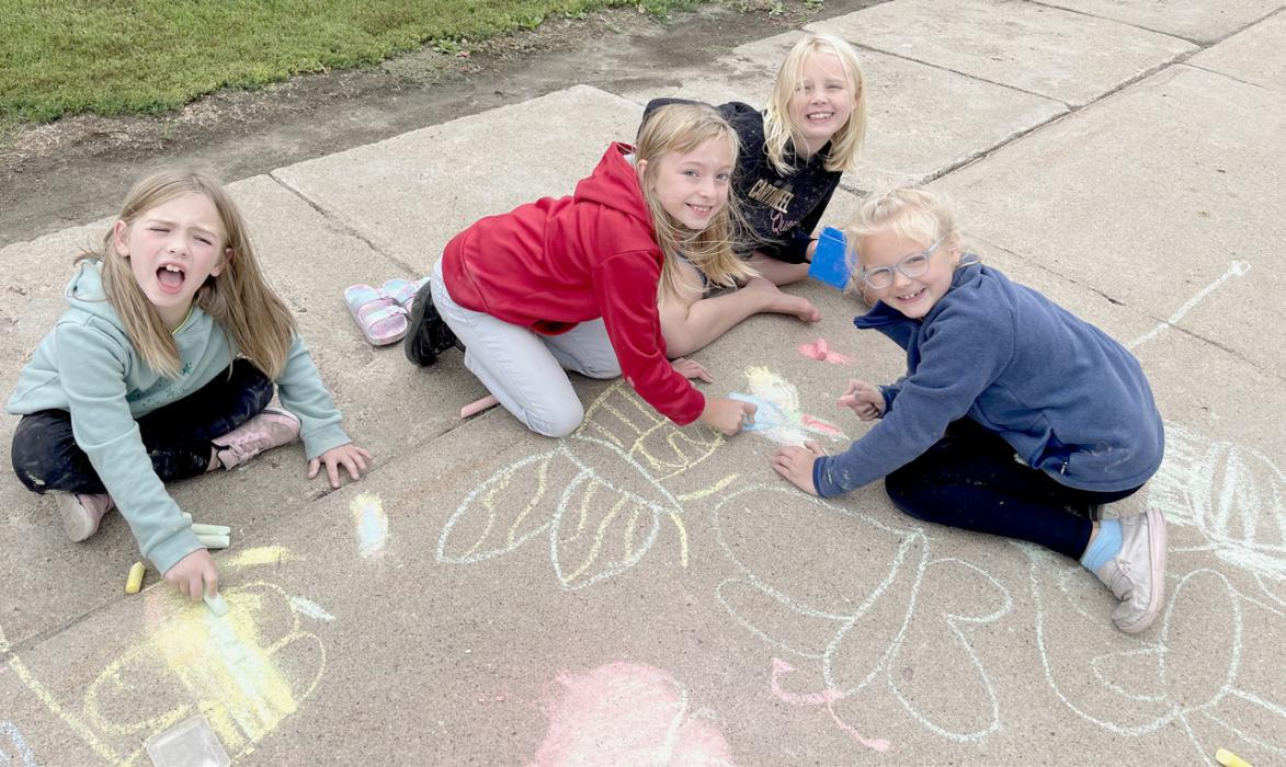 All it takes is some sidewalk chalk and some paint and the students have fun drawing on the driveway at Cottonwood Villa or painting on the windows at Sandhills Care Center. The residents at both places could enjoy watching the students having fun and will be able to enjoy looking at all the drawings in days to come.
