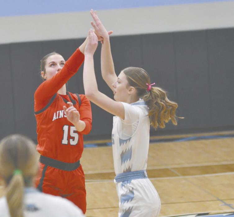 Willa Flynn is fouled as she takes a shot.