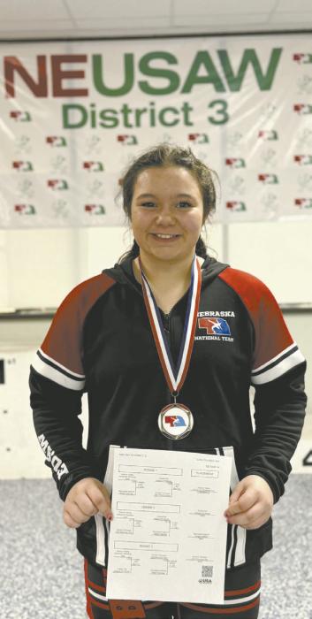 Adeline Hladky won her weight class at the district invite, making her a back-to-back district champion.