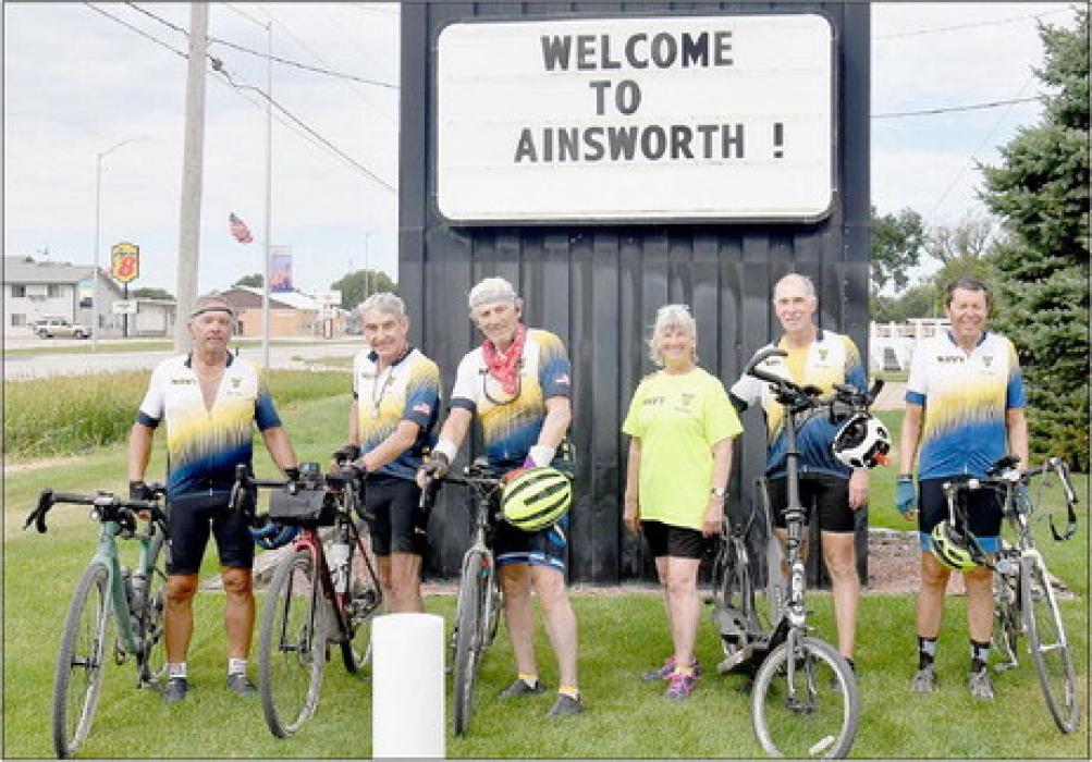Five bicycle riders from the United States Naval Academy Class of 1973 and their two support people stopped in Ainsworth on Sunday and Monday, September 3rd and 4th. The group is traveling from Astoria, Oregon to Annapolis, Maryland. They plan on arriving in Annapolis in time for their 50th Class Reunion. Members of the group are (left to right) Dave Haefnel, Bill Montgomery, Ron Bowman, Sally Leland (support, Doug Leland, Tom Tesoriero and (not pictured) Mark Landry (support).