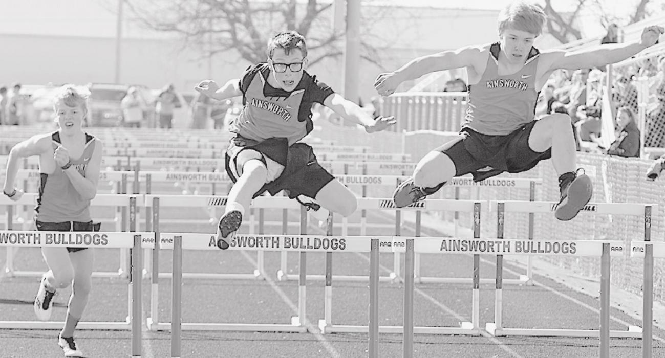 In the Boys 100 Meter Hurdles, Ryan Salzman (center) took fifth place, Jacob Held (right) placed sixth and Mason Painter (left) tied for ninth place in the Middle School Track Meet on April 1st at East City Park. Photos by Debb Gracey
