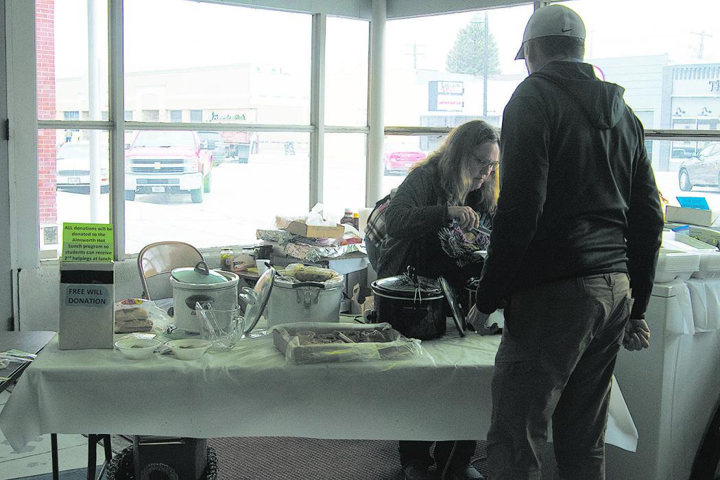 During Bargain Buyway, the United Methodist Church served food in the 1st Class Auto Showroom on Main Street.