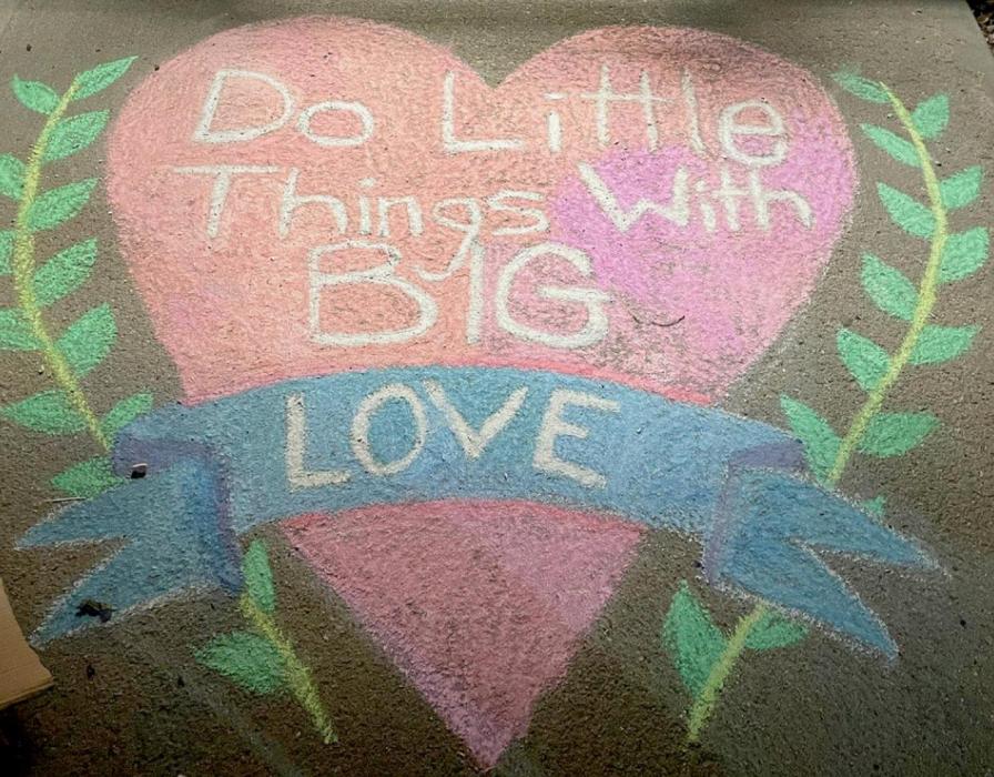In honor of World Kindness Day on November 13th, the artists of the Brown County Hospital Service Excellence Committee drew inspiring sidewalk chalk art outside of various organizations, businesses and downtown in order to promote kindness. At the entrance to Cottonwood Villa (photo above) is drawn the phrase in colorful letters, “Do Little Things with Big Love.” The artist of this chalk drawing was Alexia Schiermeyer.