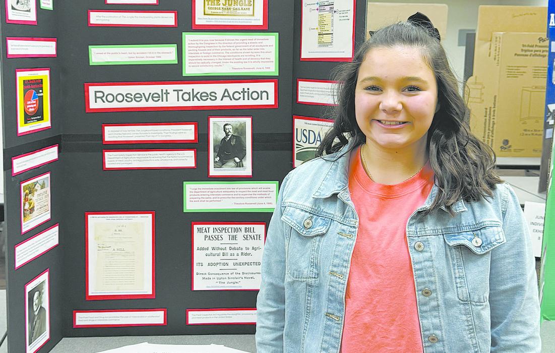 Adeline Hladky won the individual exhibit contest with her entry about the right to safe food.