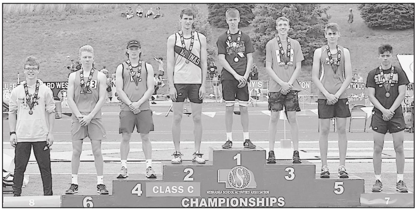 Ty Schlueter edged out Tommy Lokken of Wilber-Clatonia at the finish line to earn a third place medal in the Boys 3200 Meter Run in 10:15.78.