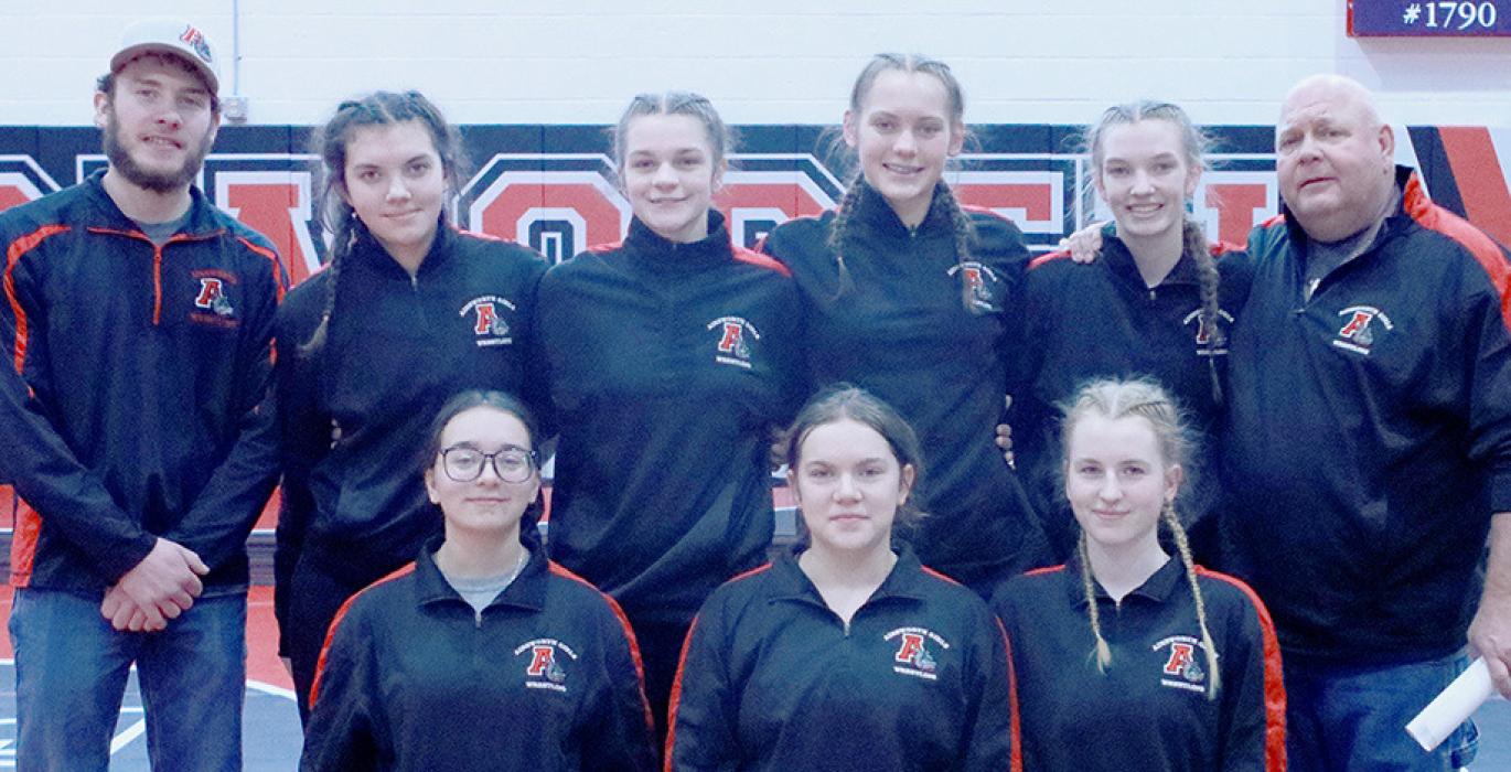 The Ainsworth Girls Wrestling Team hosted the 2024 Ainsworth Invitational on January 26th. Team members are (Back Row Left to Right) Assistant Coach Oren Pozehl, Braelyn Rudnick, Londyn Dunbar, Megan Jones, Jolyn Pozehl, Coach Todd Pollock; (Front Row Left to Right) Madison Palmer, Miranda Phares and Nelly Hoche.