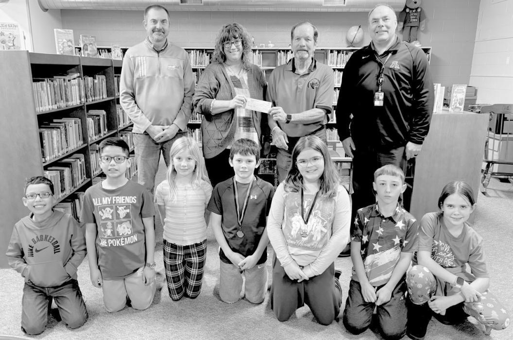 Ainsworth after school program students and staff and members of the Elks Club celebrated the donation to the ASAP program on Monday, November 25.